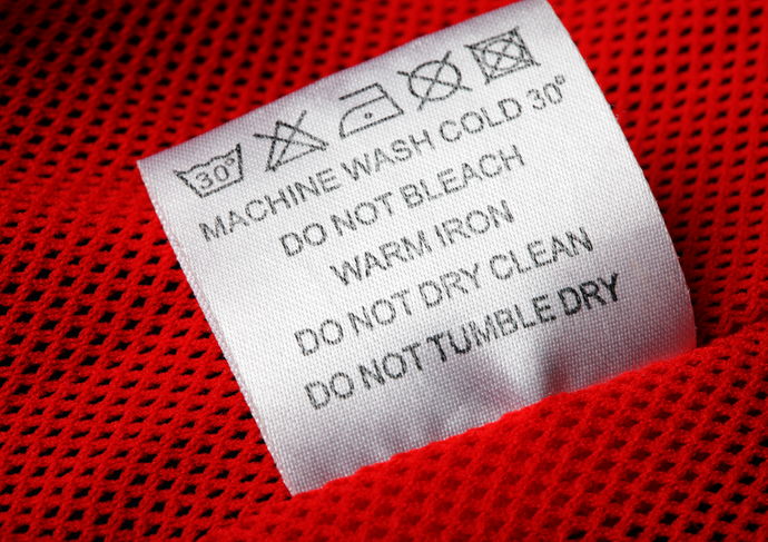 Decoding Laundry Care Tags: What Do They Mean?